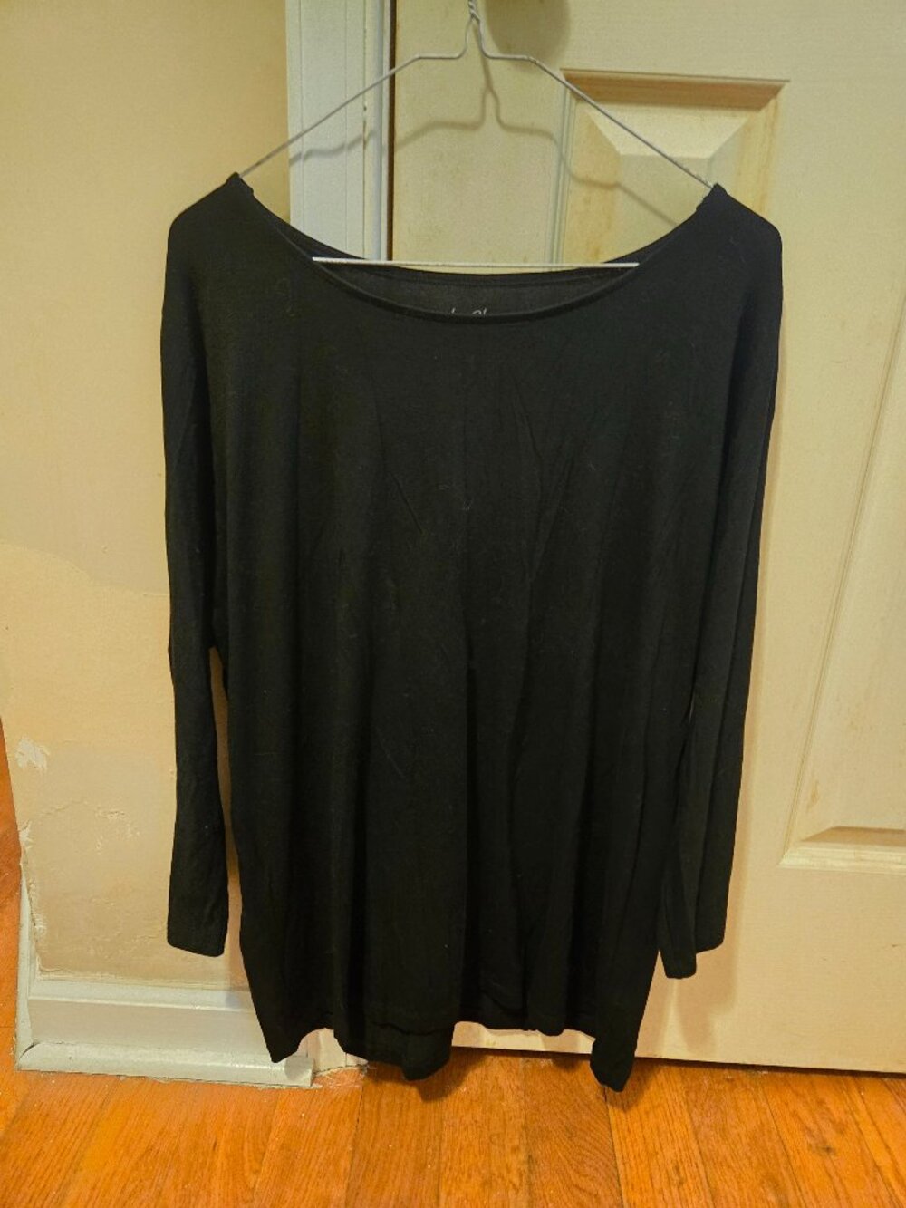 Chicos black size 3 tunic top with buttons down the sleeves as pictured above